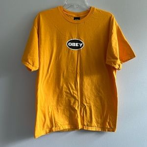 Obey men’s gold yellow logo tee